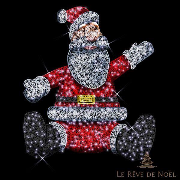 Père de Noël assis illuminé