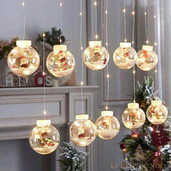 Guirlande de boules lumineuses Père Noël – Le rêve de Noël
