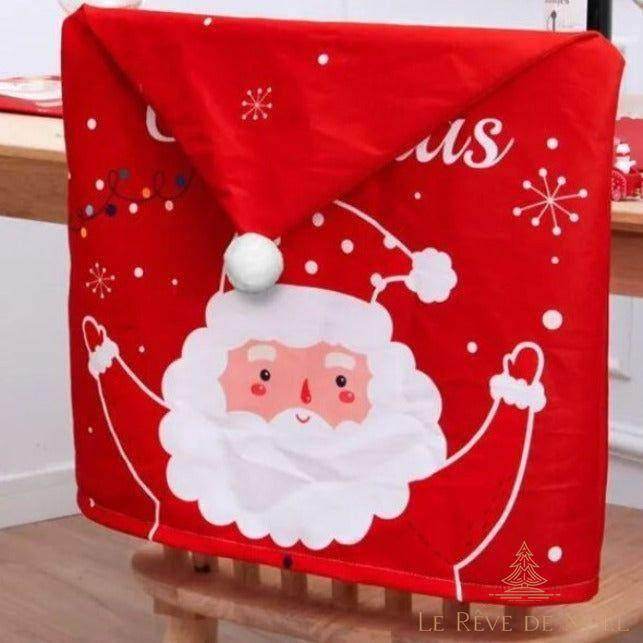 Housse de chaise rouge à motif Père Noël souriant bras levés, flocons imprimés, sur une chaise en bois