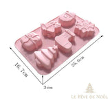 Schéma des dimensions du moule Père Noël, cloche et cadeau : 25,6 x 16,7 x 3 cm
