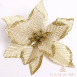 Fleur décorative ivoire à bords et nervures pailletés dorés, étamines dorées