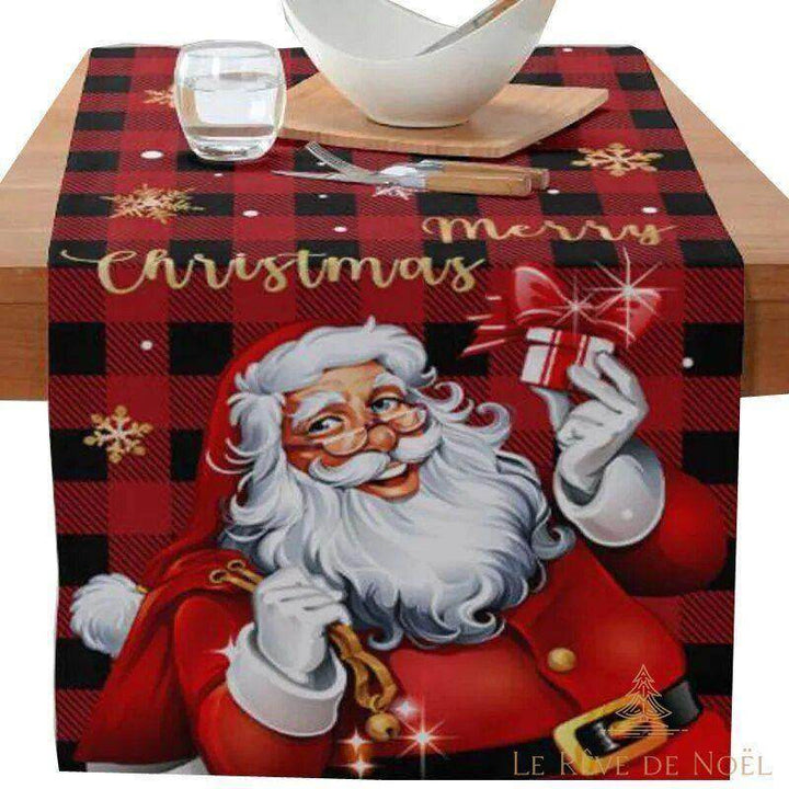 Chemin de table à carreaux, Père Noël tenant un cadeau, inscription dorée Merry Christmas