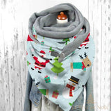 Écharpe triangle de Noël bleu ciel avec Père Noël, renne et bonhomme de neige, portée sur veste en jean
