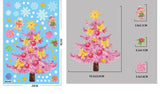 Sticker sapin de Noël rose, nœuds dorés et boules rouges, étoile dorée au sommet