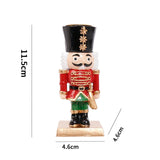Schéma des dimensions du casse-noisette épée : 11,5 cm de haut, socle de 4,6 x 4,6 cm
