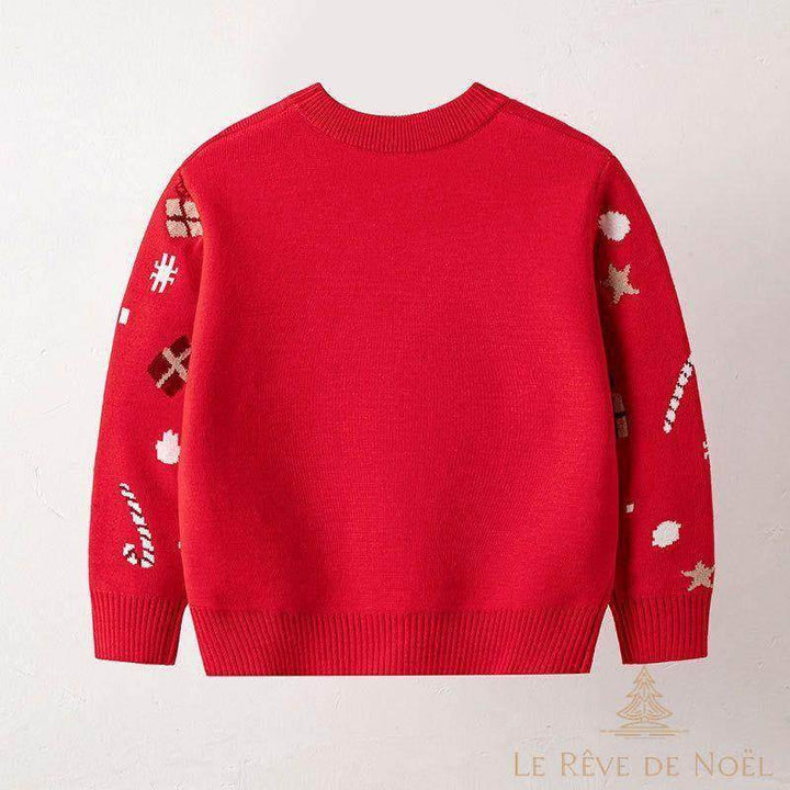 Dos du pull de Noël enfant rouge, uni avec motifs cadeaux et étoiles sur les manches