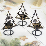 Trois bougeoirs sapin en métal noir, silhouettes Père Noël, renne et texte Joyeux Noël, sur bois