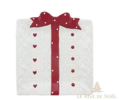 Assiette en forme de cadeau blanc noué d'un ruban rouge à pois