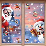 Fenêtre en bois au coucher de soleil avec stickers de Noël : Père Noël à lunettes et bonhomme de neige