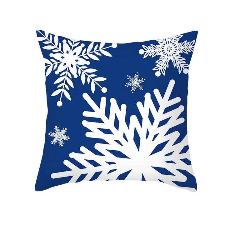 Housse de coussin bleu marine avec un grand flocon de neige blanc en gros plan