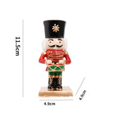 Schéma des dimensions du casse-noisette tambour : 11,5 cm de haut, socle de 4,9 x 4,9 cm