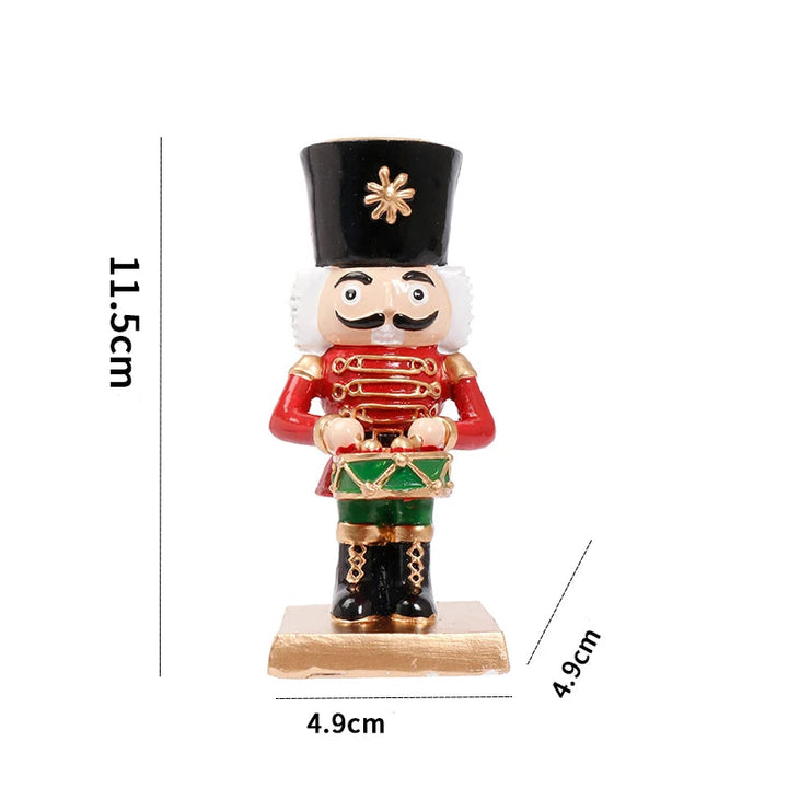 Schéma des dimensions du casse-noisette tambour : 11,5 cm de haut, socle de 4,9 x 4,9 cm