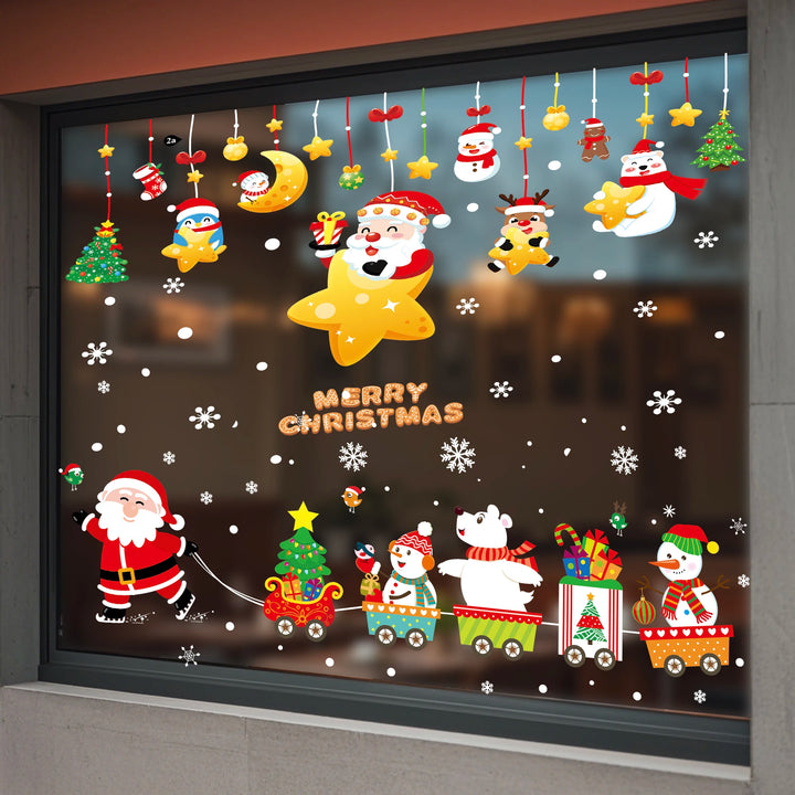 Sticker vitrine au crépuscule : Père Noël tirant un train de wagons avec sapin et bonhommes de neige