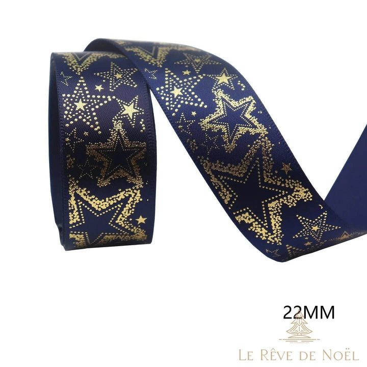 Ruban satin bleu marine imprimé d'étoiles dorées, enroulé, largeur 22 millimètres