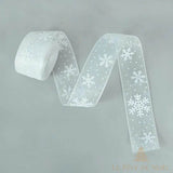 Rouleau de ruban organza blanc large, motif flocons, variante 2,5 cm déroulée en boucle