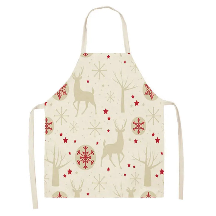 Tablier de Noël écru à motif répété de rennes beiges, étoiles rouges et flocons géométriques