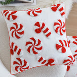 Gros plan sur la broderie en relief des sucres d'orge et bonbons, coussin de 45 x 45 cm