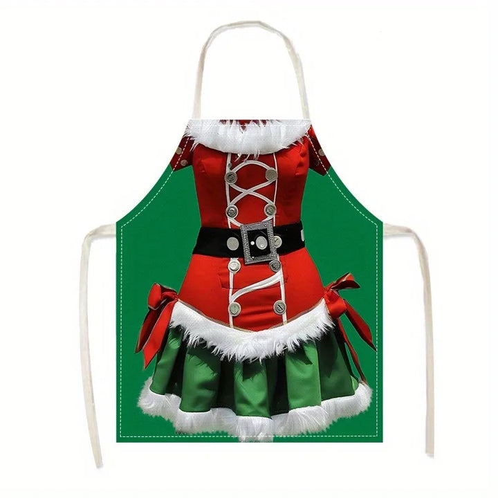 Tablier de Mère Noël à plat sur fond blanc, robe rouge et jupe verte, lanières nouées