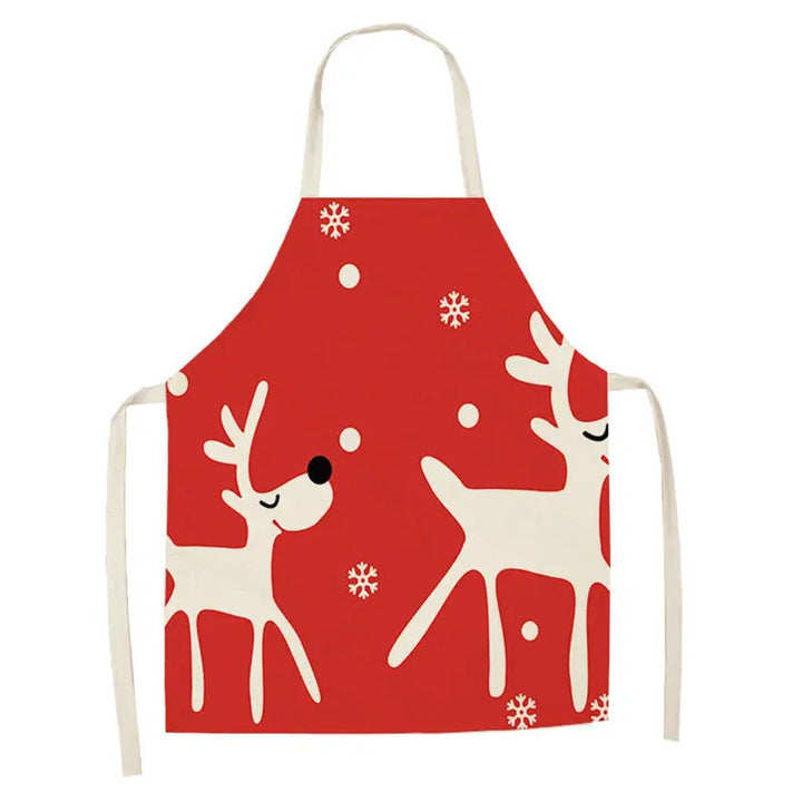 Tablier de Noël rouge avec deux rennes blancs stylisés et flocons épars