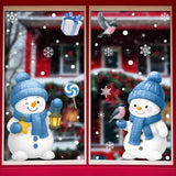 Stickers bonhomme de neige avec oiseau posé sur la main, fenêtre devant façade rouge