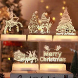 Cinq veilleuses LED acryliques allumées : renne, lutins, sapin, traîneau et texte Merry Christmas