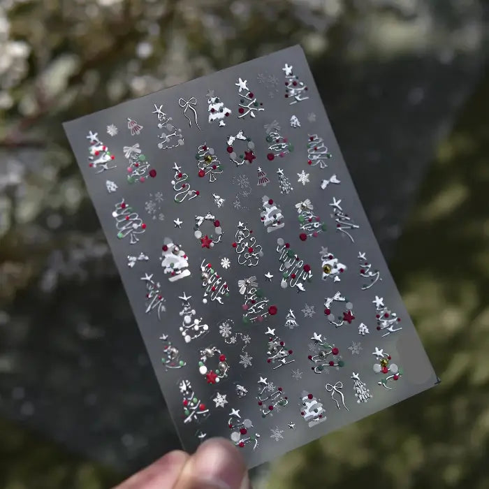 Planche de stickers ongles à sapins argentés en fil scintillant et flocons blancs