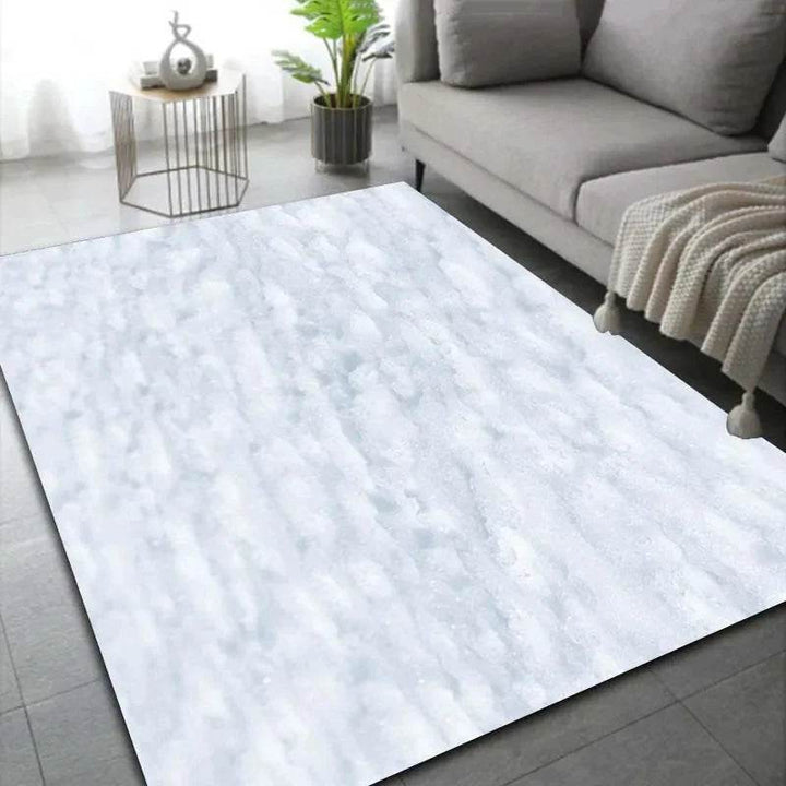 Tapis effet neige, variante Neige 6, rayures striées blanc-bleu façon congère, salon au plaid