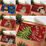 Photo assemblée de six tapis d'entrée de Noël à motifs différents, posés sur un parquet