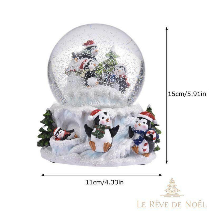 Schéma des dimensions de la boule à neige Pingouin : 15 cm de haut sur 11 cm de large