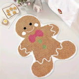 Tapis en forme de bonhomme en pain d'épices beige, contour blanc, nœud rose, posé au sol