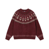 Pull de Noël femme vintage bordeaux, motif jacquard beige sur l'encolure, présenté à plat