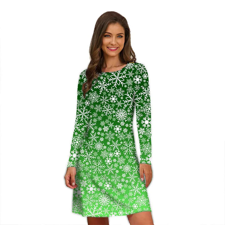 Robe de Noël verte à motif de flocons blancs dégradés, manches longues, portée en studio