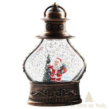 Lanterne bronze façon boule à neige à paillettes, Père Noël et sapin à l'intérieur