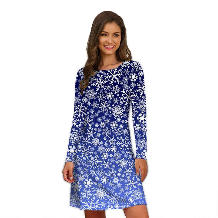 Robe de Noël bleu roi à motif de flocons blancs dégradés, manches longues, portée en studio