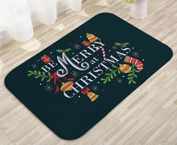 Tapis vert foncé posé au sol : texte Be Merry at Christmas entouré de clochettes et de houx