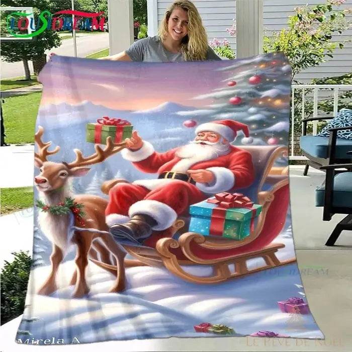 Plaid de Noël motif traîneau : Père Noël assis, cadeau en main, à côté d'un renne attelé