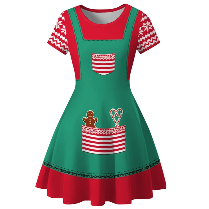 Robe de Noël verte façon tablier sur manches rouges à flocons, poche à bonhomme de pain d'épice