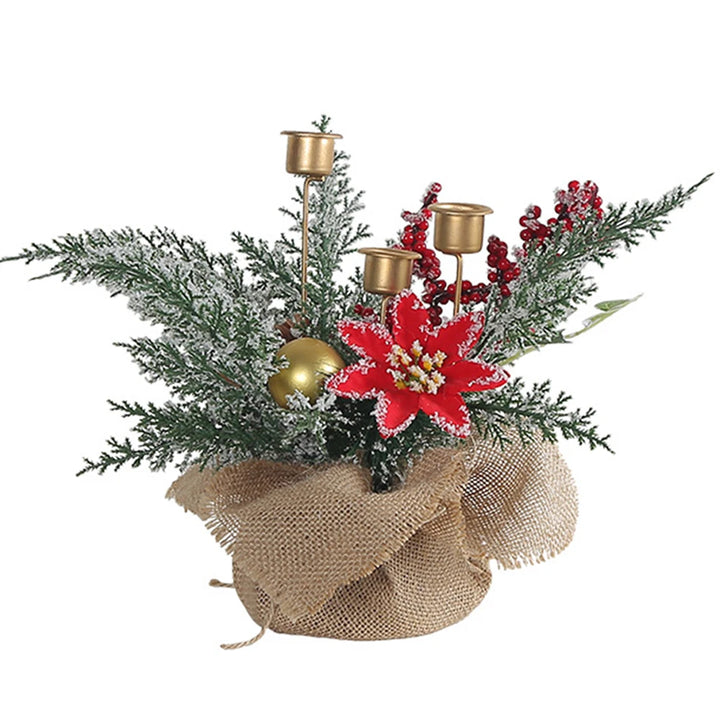 Bougeoir de table avec fleur de poinsettia rouge, branches enneigées et boule dorée