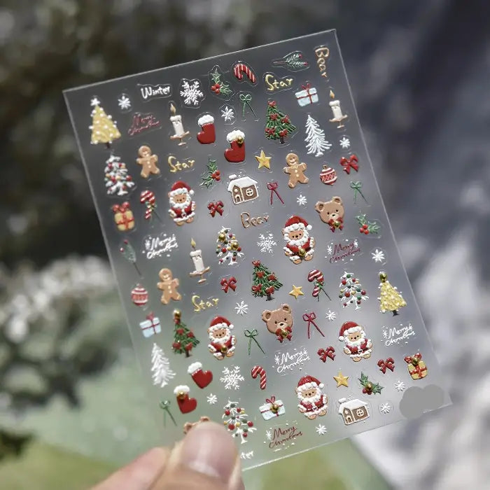 Planche de stickers ongles tenue en main : Père Noël, sapins, chaussette et sucres d'orge