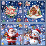 Fenêtre à cadre gris-bleu avec stickers de Noël : maison en pain d'épice, Père Noël et bonhomme de neige