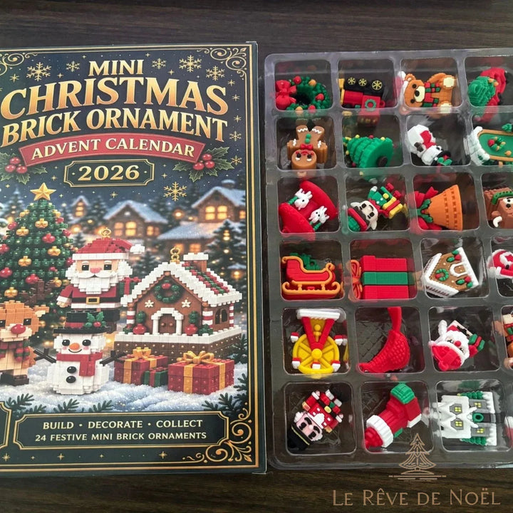 Boîte du calendrier briques et plateau à 24 cases rempli de pièces