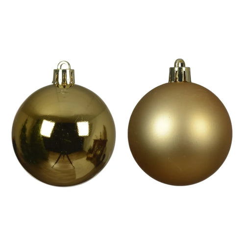 Deux boules de Noël dorées du lot, une brillante et une mate