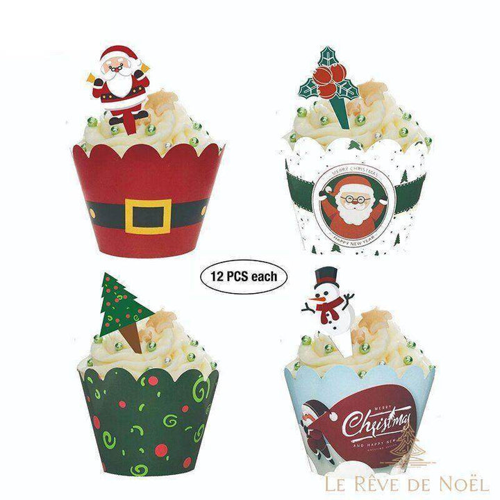 Quatre cupcakes à glaçage blanc avec collerettes Père Noël, sapin et bonhomme de neige