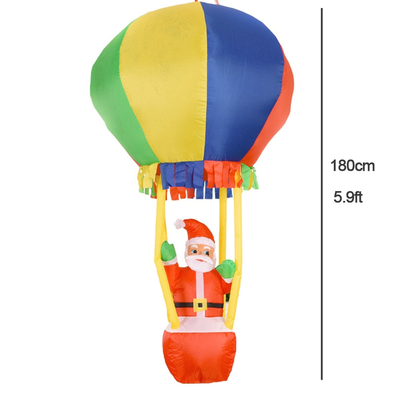 Structure de Noël gonflable : Père Noël dans la montgolfière