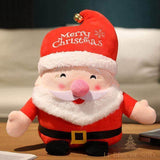 Peluche de Père Noël vue de face, posée sur un bureau en bois près d'un canapé