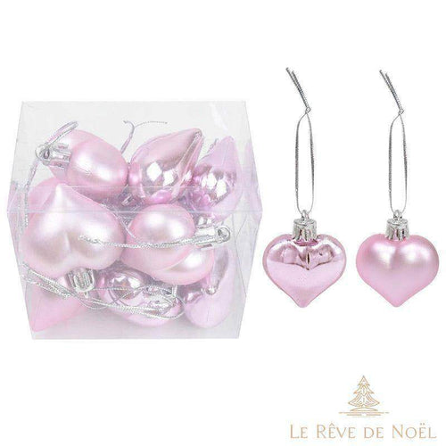 Boules de Noël en forme de cœur rose, finitions brillante et mate, suspendues à un cordon argenté