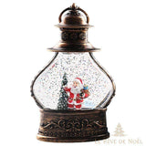 Boule à neige en forme de lanterne bronze, Père Noël miniature et sapin, paillettes à l'intérieur